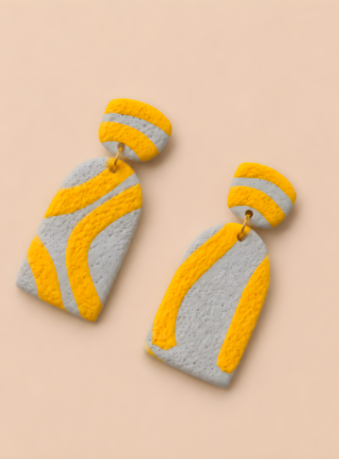 Minimalist abstract polymer clay earrings showcasing handcrafted texture and modern design.